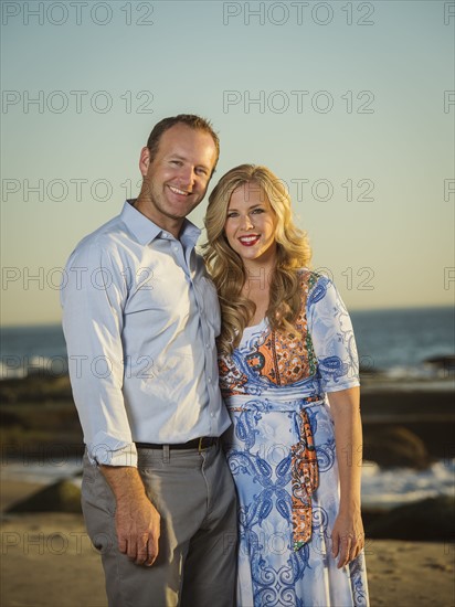 Couple standing on beach