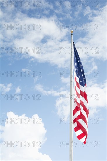 American flag against blue sky