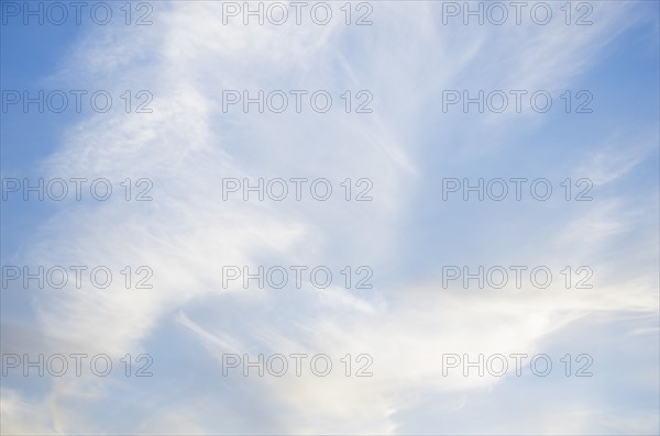 Cirrus clouds on blue sky