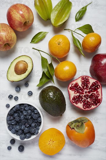 Fruits on white surface