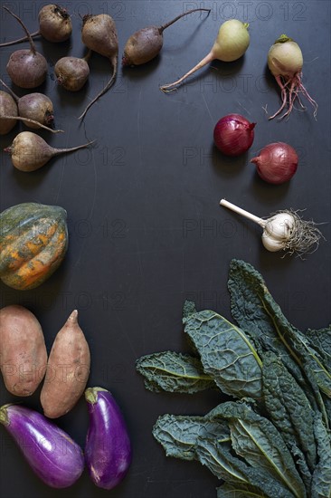 Vegetables on dark surface