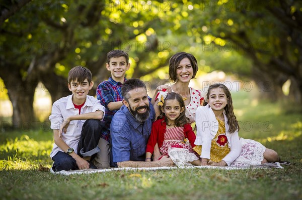 Family sitting and smiling