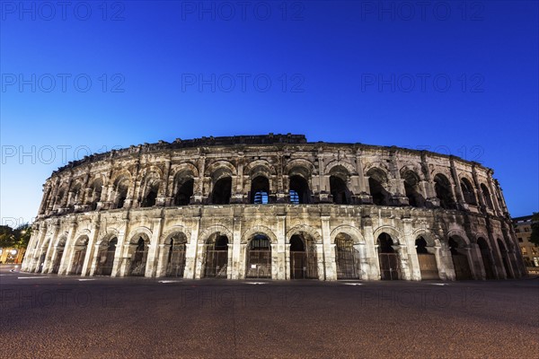 France, Occitanie, Nimes, Arena of Nimes at dusk