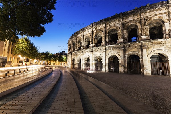 France, Occitanie, Nimes, Arena of Nimes at dusk