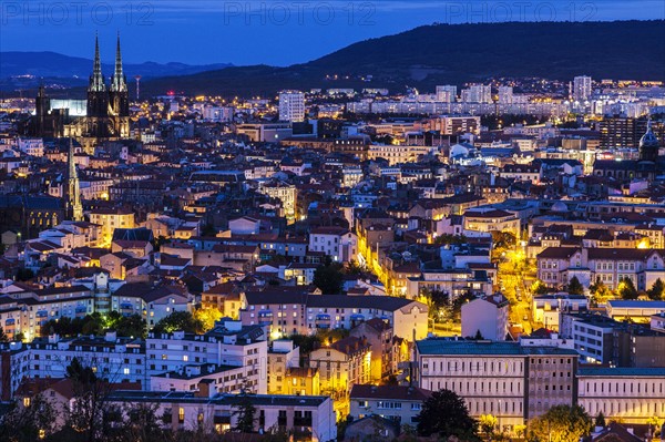 France, Auvergne-Rhone-Alpes, Clermont-Ferrand, Cityscape at dusk