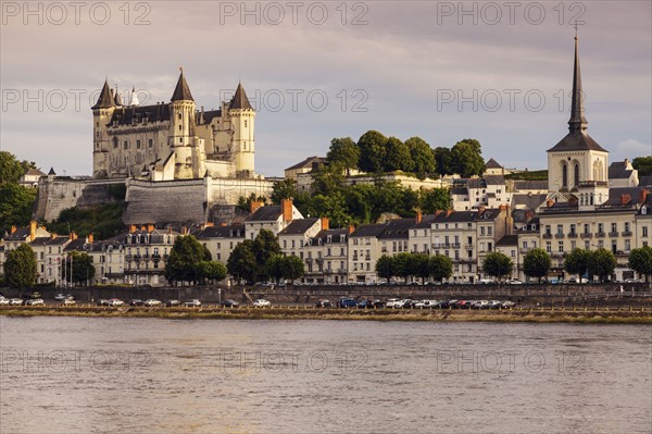 France, Pays de la Loire, Saumur, City waterfront at sunset