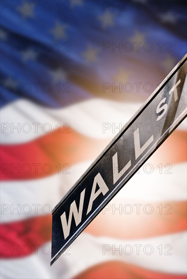 USA, New York State, New York City, Wall street sign with American Flag.