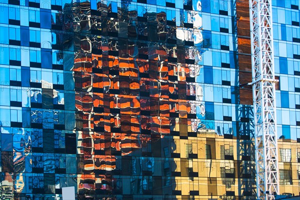 USA, New York State, New York City, Detail of glass facade with reflections
