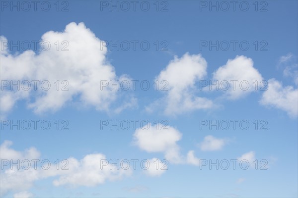 Cumulus clouds on blue sky