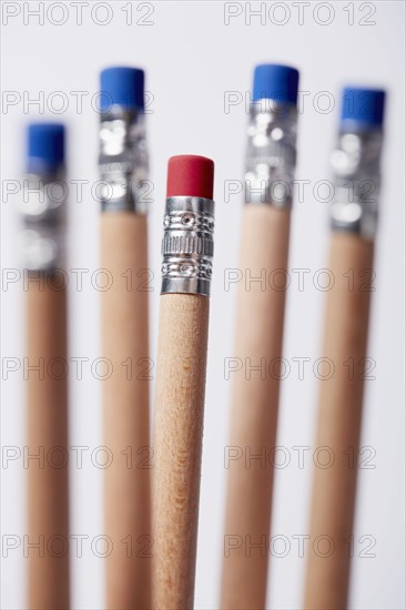 Wooden pencils, one with red eraser