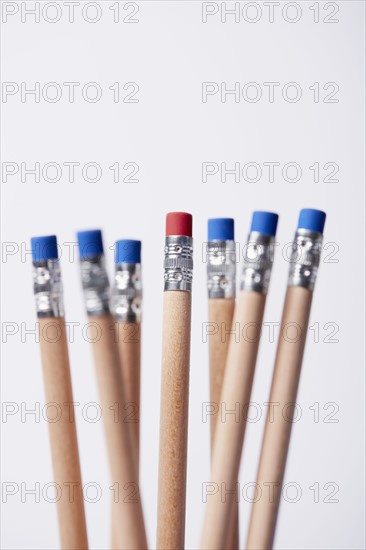 Wooden pencils, one with red eraser