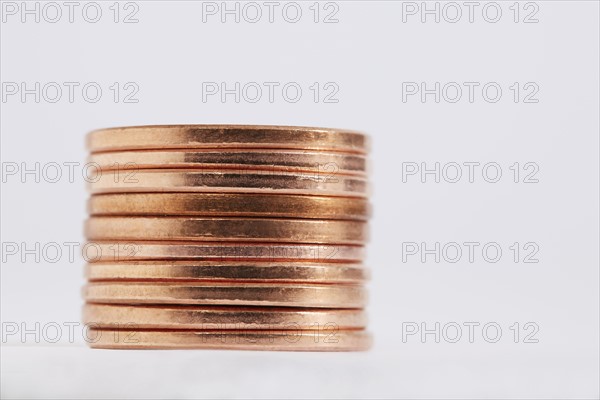 Stack of coins on white background