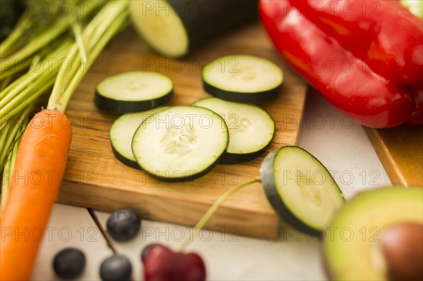 Close-up of zucchini slices on cutting board