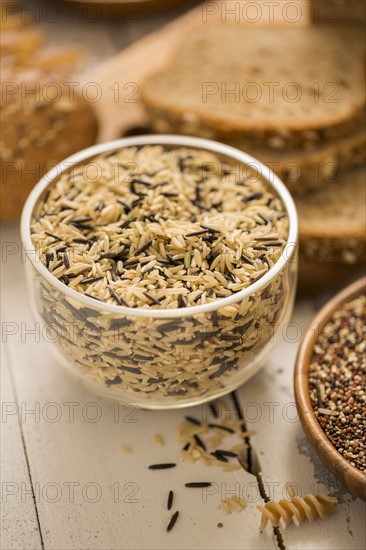 Brown and black rice in bowl