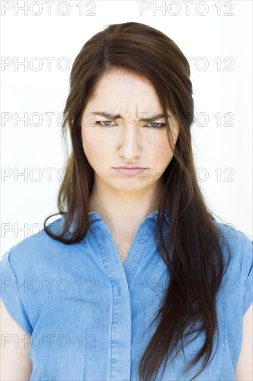 Portrait of woman making sad expression