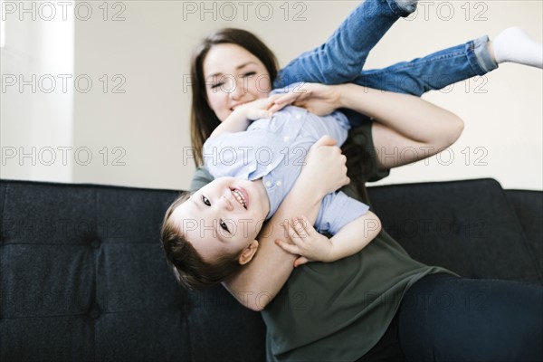 Mother playing with son (4-5)