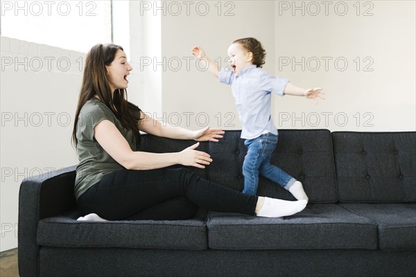 Mother playing with son (4-5)