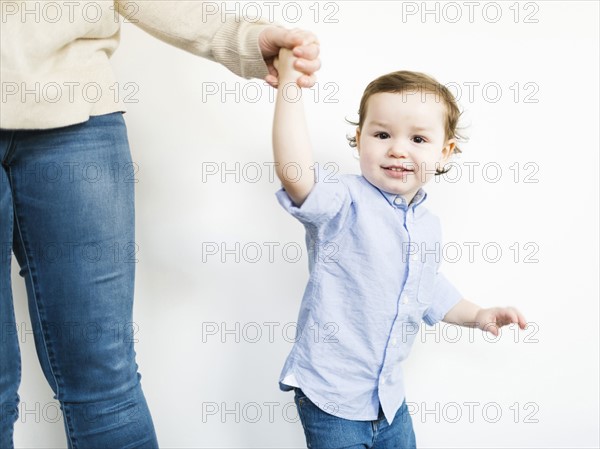 Mother posing with son (4-5)