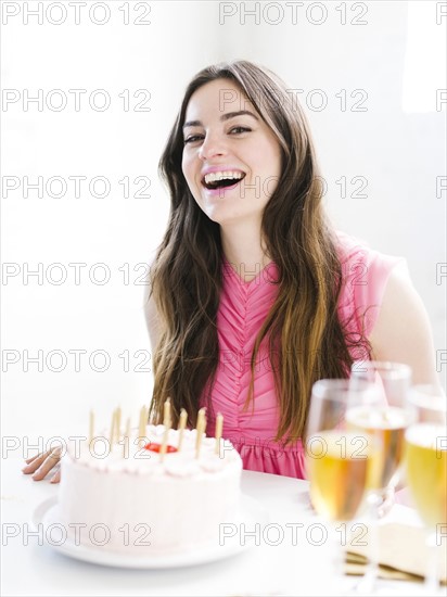 Portrait of woman at birthday party