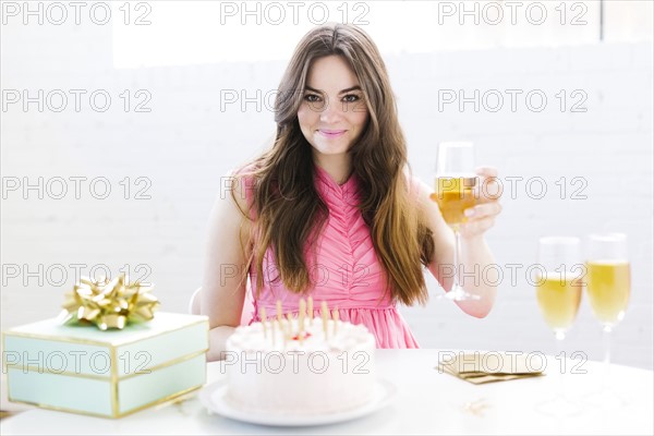 Portrait of woman at birthday party