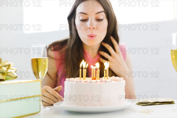 Portrait of woman at birthday party