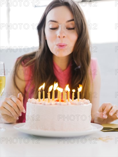 Portrait of woman at birthday party