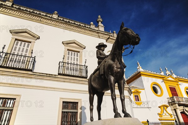 Spain, Seville, Equestrian statue of Augusta Senora Condesa de Barcelona in front of Plaza de Toros