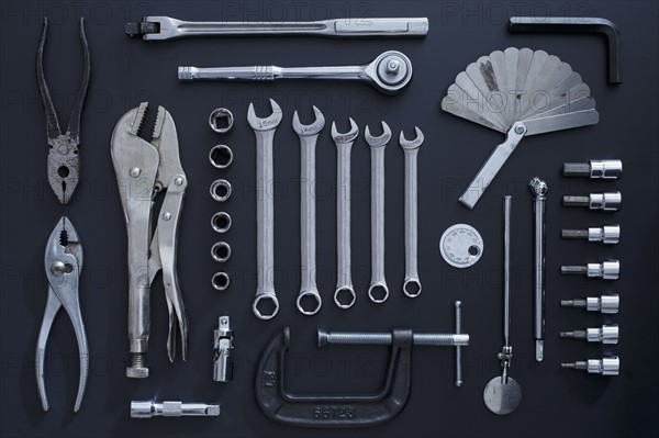 Studio shot of work tools on black background