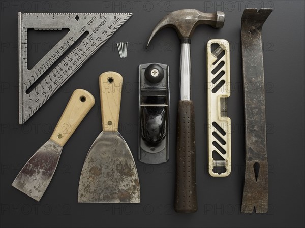 Studio shot of work tools on black background