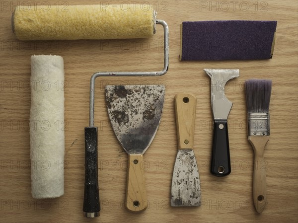 Studio shot of painting tools on wooden table