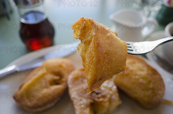 Piece of french toast on fork