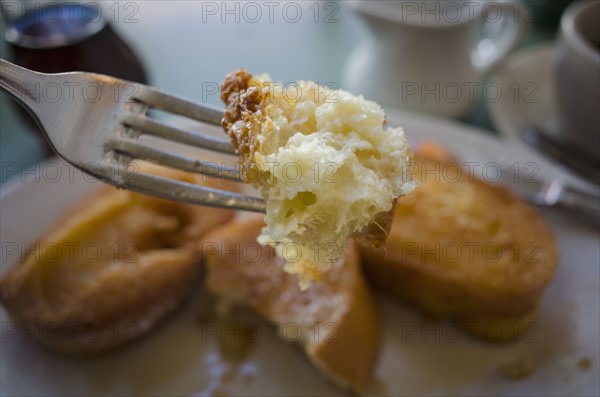 Piece of french toast on fork