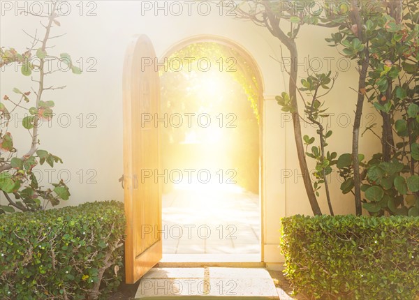 Building exterior with backlit doorway