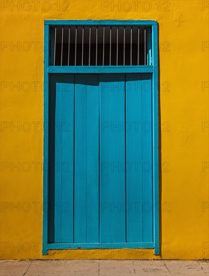 Cuba, Havana, Building exterior with blue door