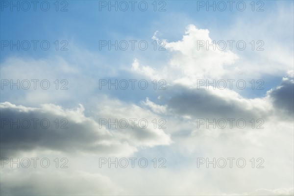 Cumulus clouds on sky