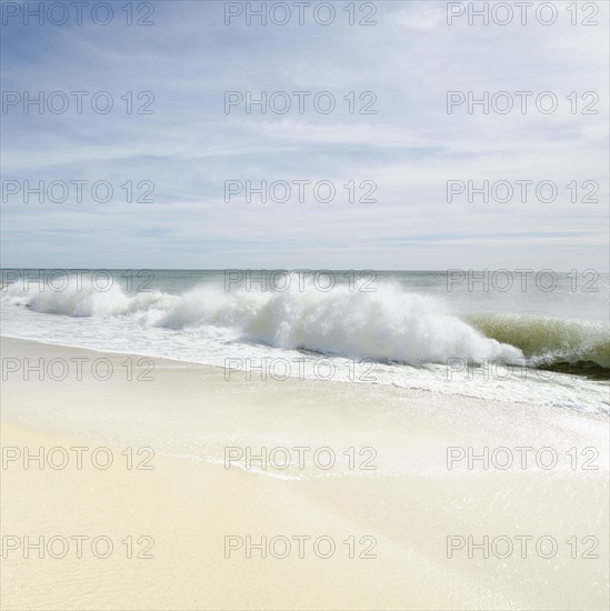Sandy beach with waves