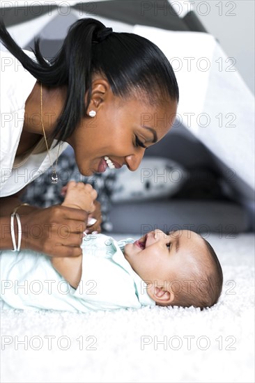 Mother looking at baby boy (2-5 months)