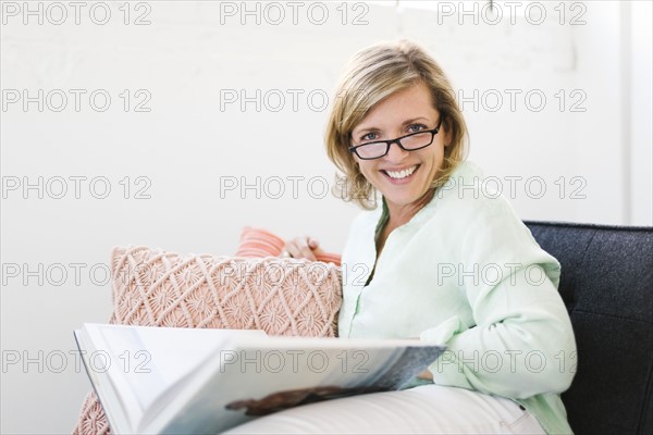 Portrait of Mature woman reading book