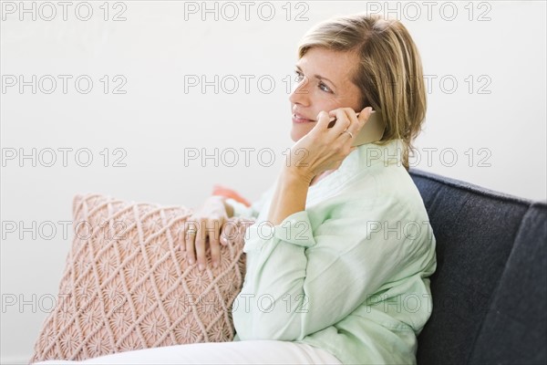 Mature woman using phone