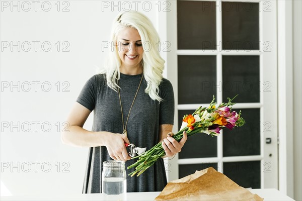 Woman cutting bouquet