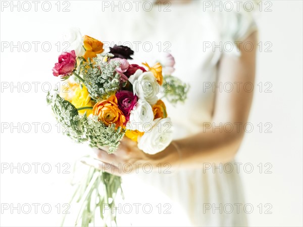 Woman holding bouquet