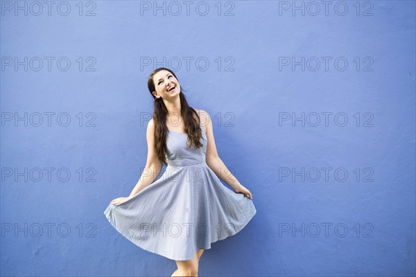 Beautiful happy woman dancing