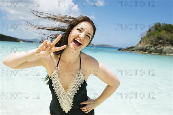 USA, Virgin Islands, Saint Thomas, Beautiful woman having fun in ocean