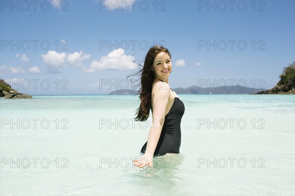 USA, Virgin Islands, Saint Thomas, Beautiful woman standing in ocean