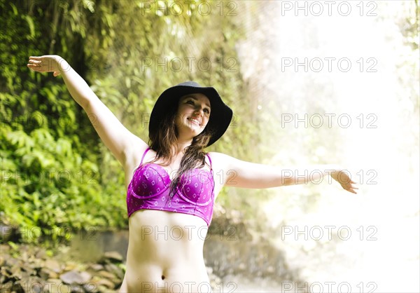 Caribbean, Saint Lucia, Happy woman with arms outstretched