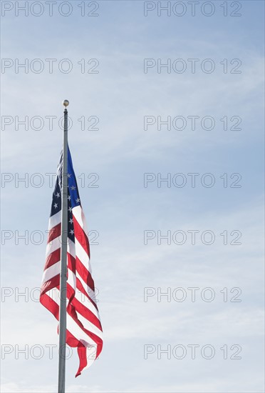 American flag against blue sky