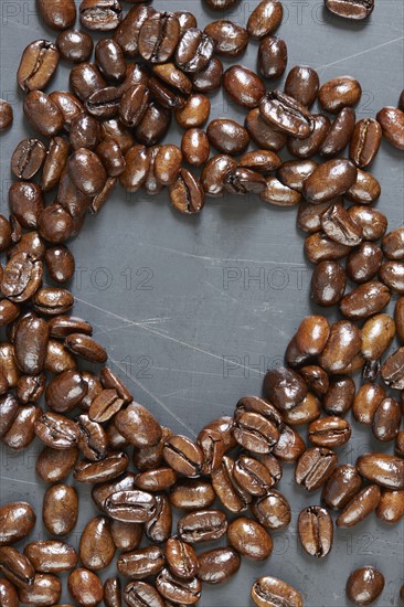 Heart shape made of roasted coffee beans