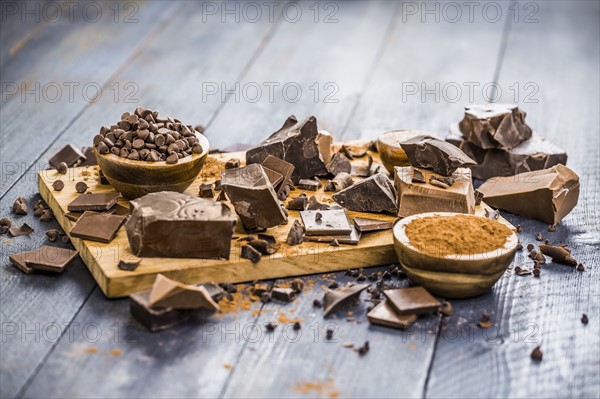 Various chocolate pieces on cutting board