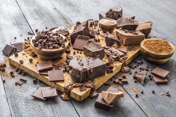 Various chocolate pieces on cutting board