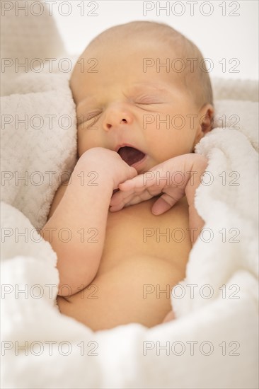 Baby boy (0-1 months) yawning